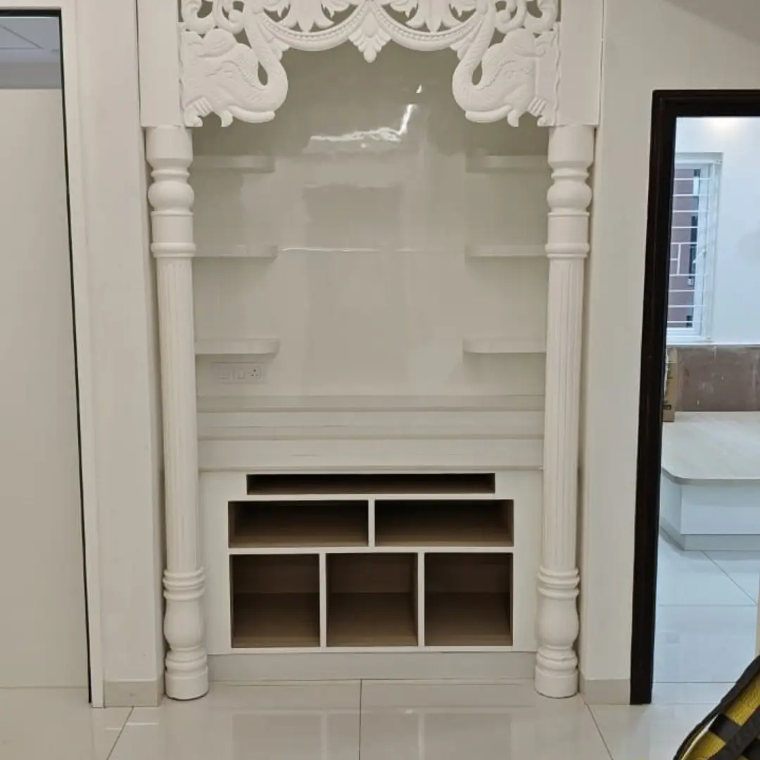 Compact corner marble mandir for home in an apartment