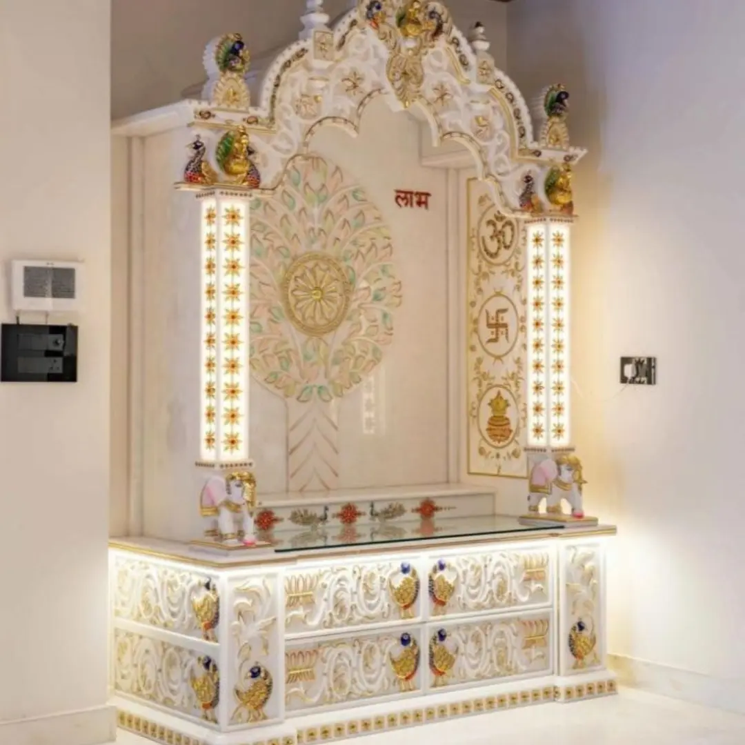 Luxury marble pooja room with golden details
